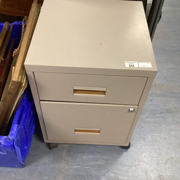 Vintage two-drawer metal filing cabinet for office storage.