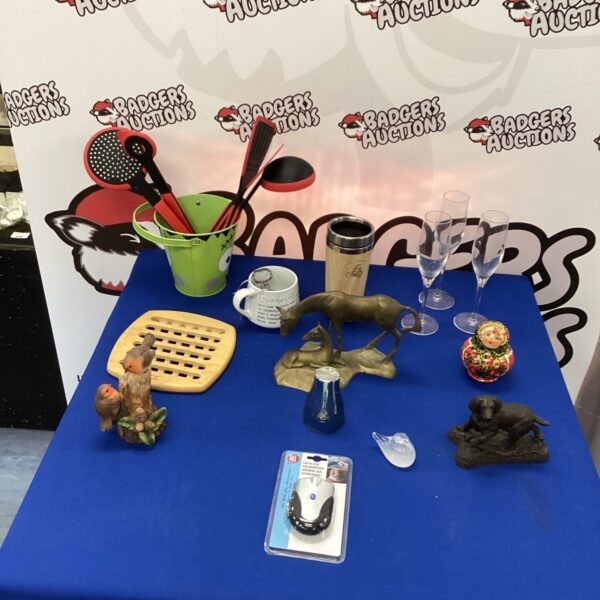Mixed collectibles lot featuring brass horse and vintage figurines.