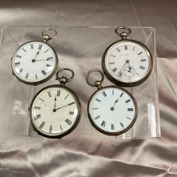 Lot of four antique silver pocket watches for repair.