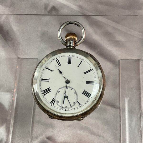Antique 935 silver pocket watch with Roman numerals.