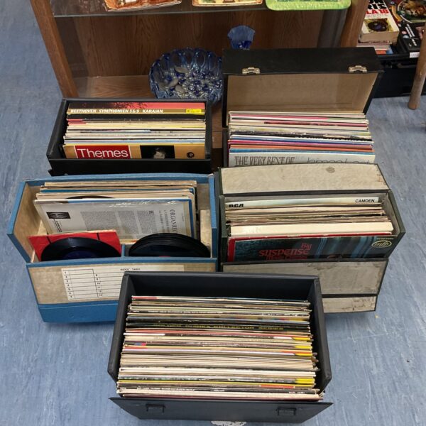 Large lot of vintage vinyl records for music collectors.