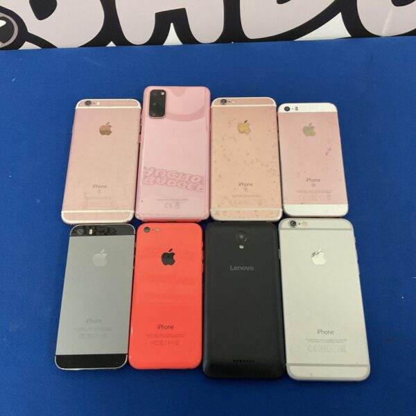 Mixed lot of used mobile phones including Apple iPhone and Samsung.