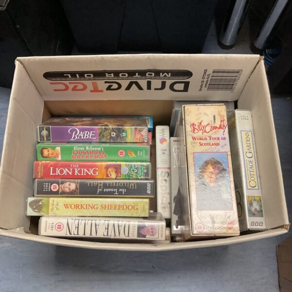 VHS cassette collection featuring Disney's Lion King and Billy Connolly.