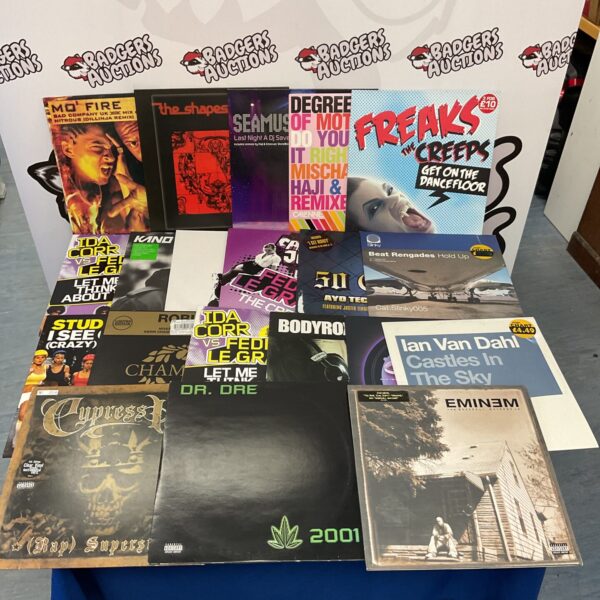 Selection of drum and bass vinyl records including Dr Dre and Eminem.