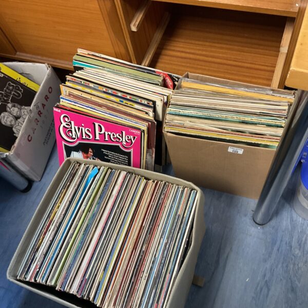 Large lot of vinyl records including Elvis Presley albums.