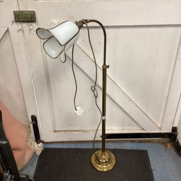 Vintage brass standard lamp with a flower petal shade.