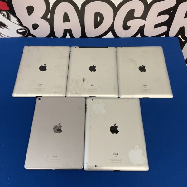 Lot of five Apple iPads presented for consideration.