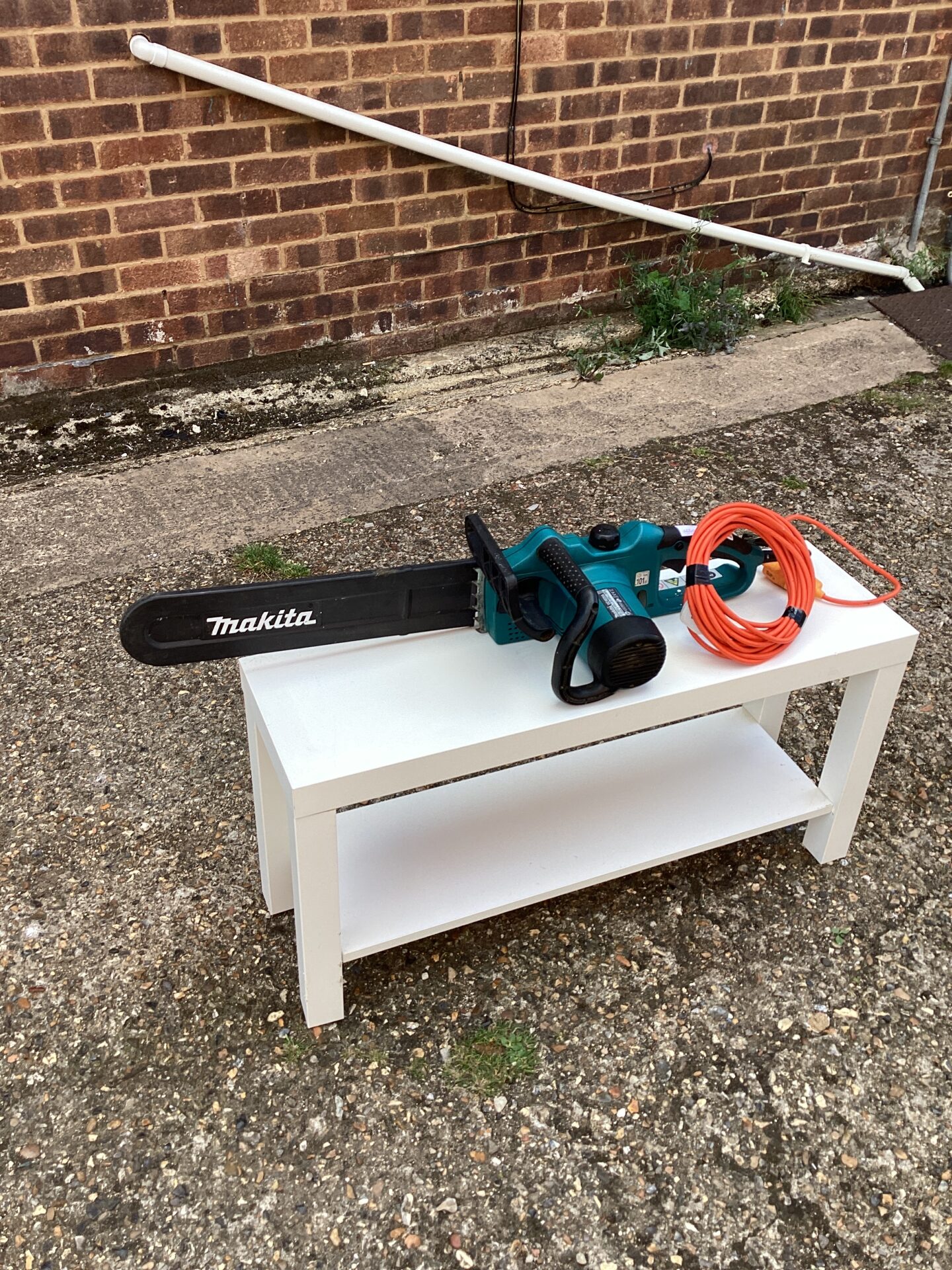 899 Makita Electric Chainsaw sold as seen