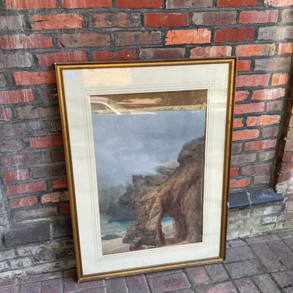 Vintage H Stacey watercolour painting of a dramatic coastal cliff scene.