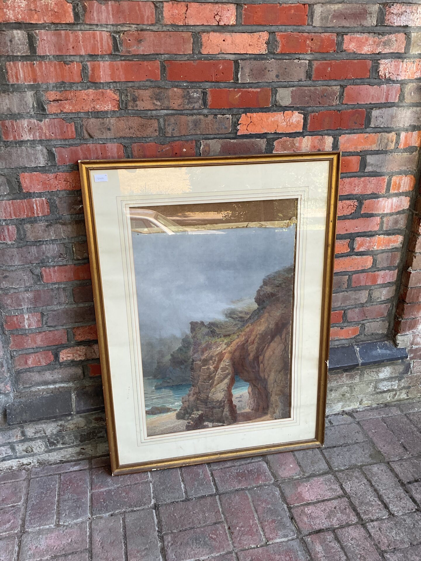 576 h e stacey watercolour of a coastal cliff scene (slipped in frame)