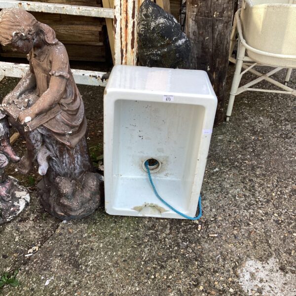 Vintage Belfast sink with a deep basin and fireclay construction.