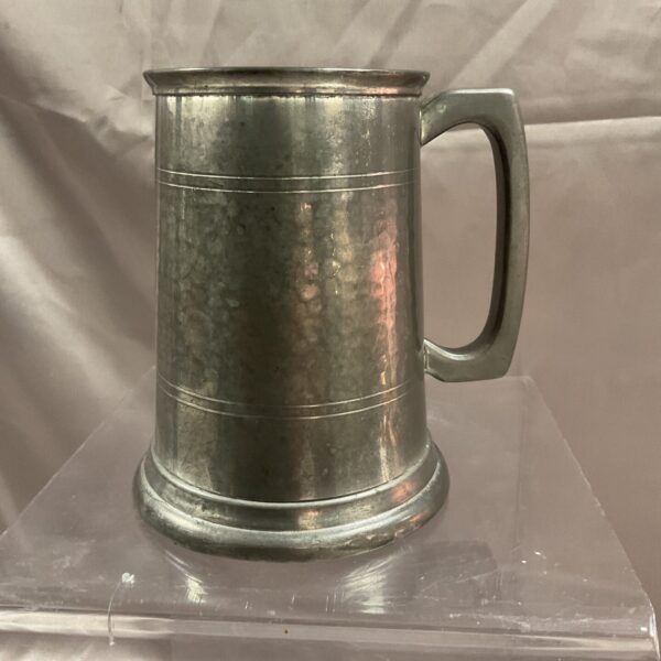 Antique Sheffield pewter tankard with a grey patina.