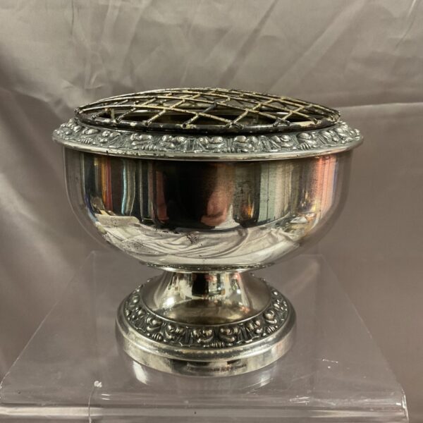 Ornate silverplate rose bowl with pierced floral holder.