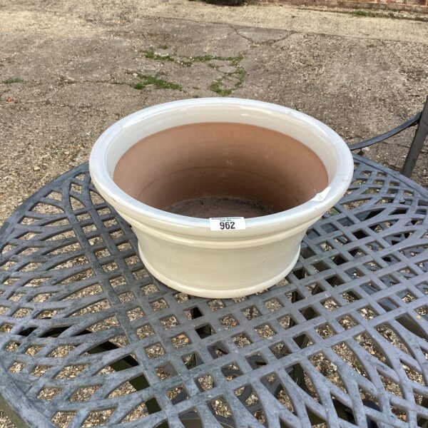 Glazed garden planter for outdoor plants and garden decor.