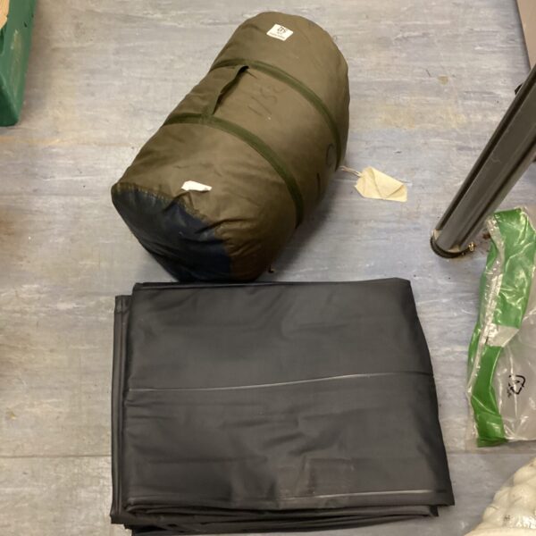 Camping groundsheets and sleeping bag lot for outdoor adventures.