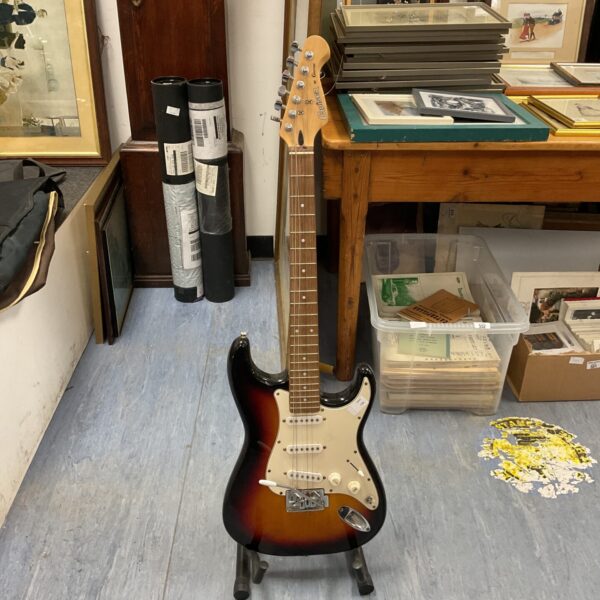 Sunburst finish Cruiser electric guitar, vintage style instrument.