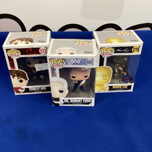 Funko Pop figures lot including Bruce Lee, Stanley Uris, and Dr. Robert Ford.