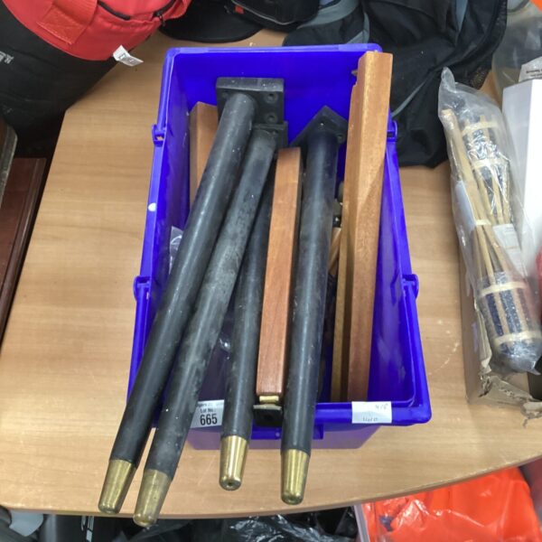 Vintage wooden table legs with brass ferrules, ideal for furniture restoration.