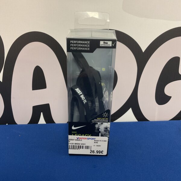 Nike Legacy swimming goggles in packaging, sports eyewear.