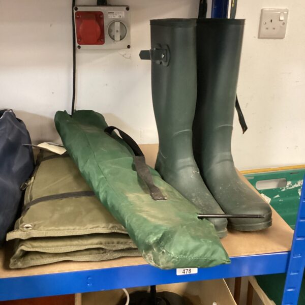 Wellington boots and fishing mat lot for outdoor use.