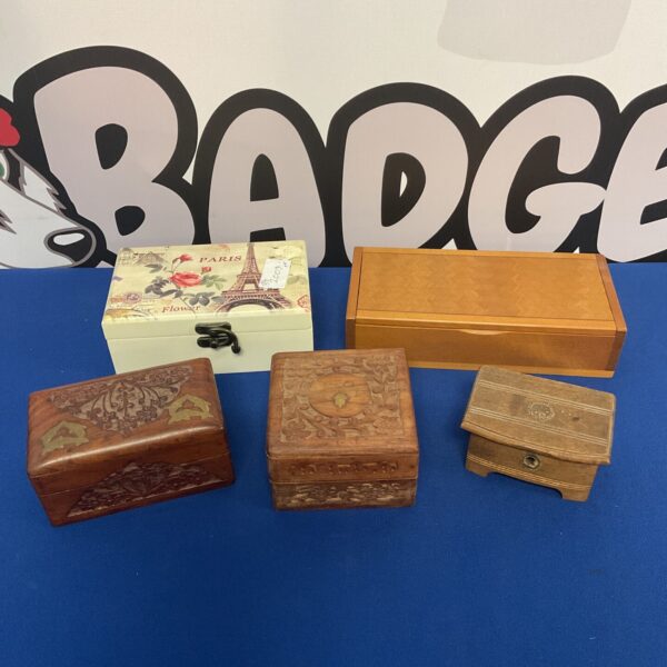 Lot of five vintage wooden trinket boxes with painted designs.