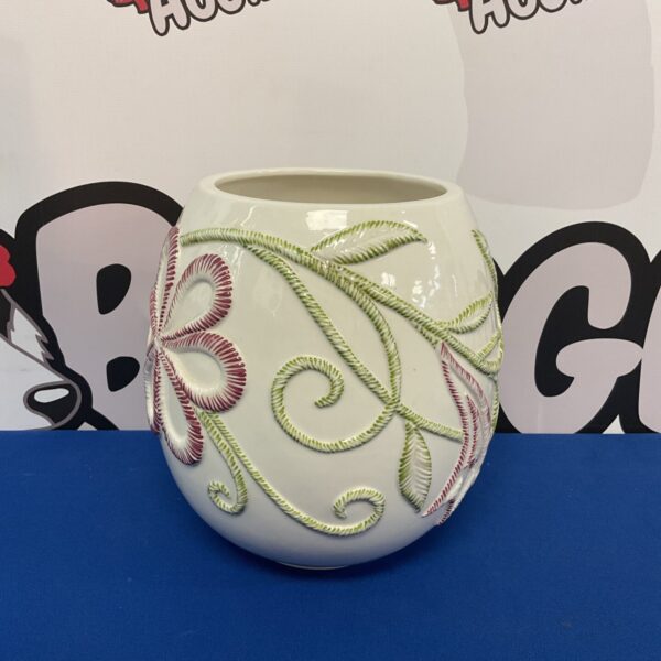 Elegant Villeroy & Boch ceramic vase with floral design.