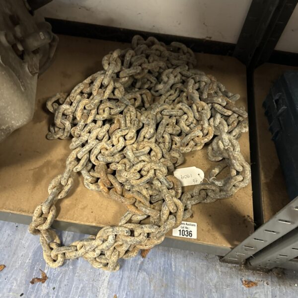 Heavy duty industrial chain with large metal links.