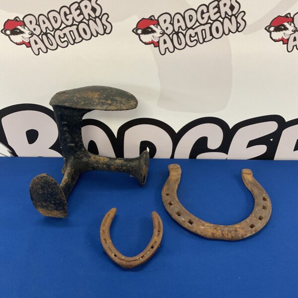 Antique horseshoe and cobblers last collection, vintage blacksmith tools.