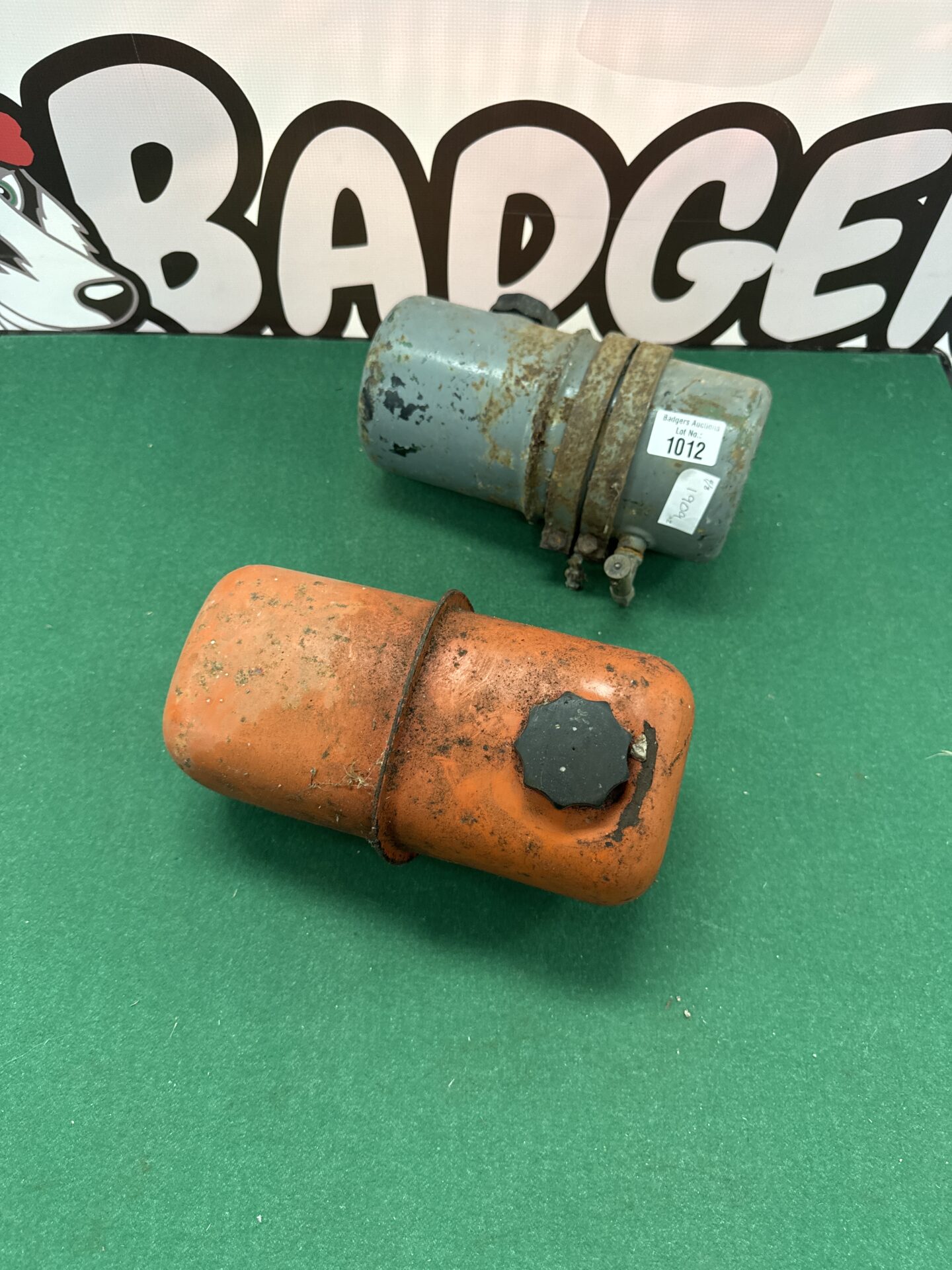 905 Two vintage mower fuel tanks