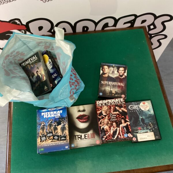 Mixed DVD and box set bundle for home entertainment.