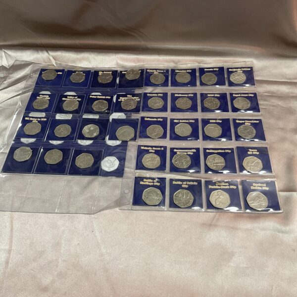 Collection of 50p commemorative coins for collectors.
