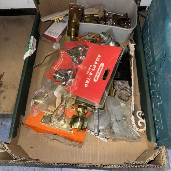 Vintage brass door furniture lot with handles and knobs.