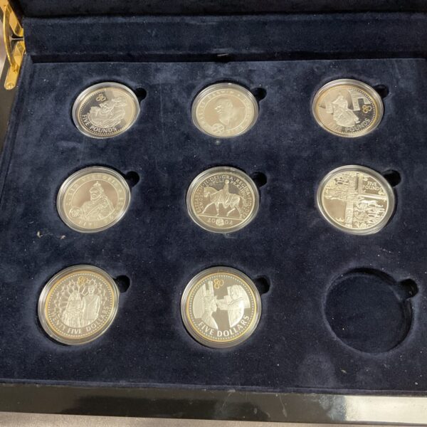 Open presentation case of Queen Elizabeth II silver proof coin collection.