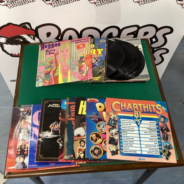 Mixed lot of 70s and 80s vinyl records for collectors.