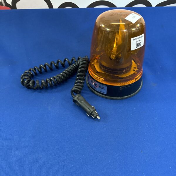 Orange Britax 12v beacon lamp for vehicles, showing wear.