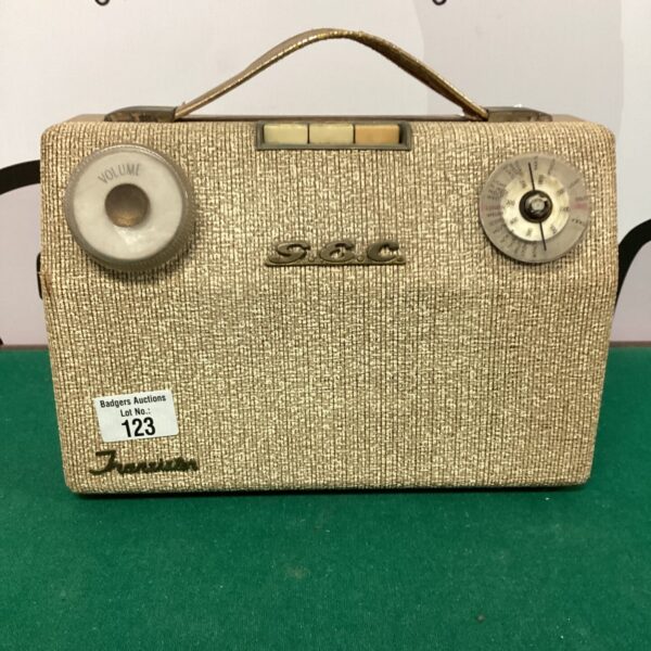 Vintage GEC radio cabinet with tuning dial and controls.