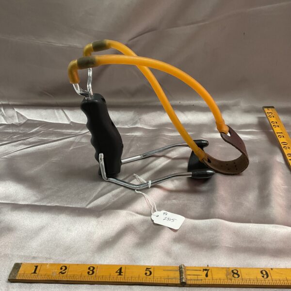 Vintage Black Widow catapult slingshot for collectors and outdoor use.
