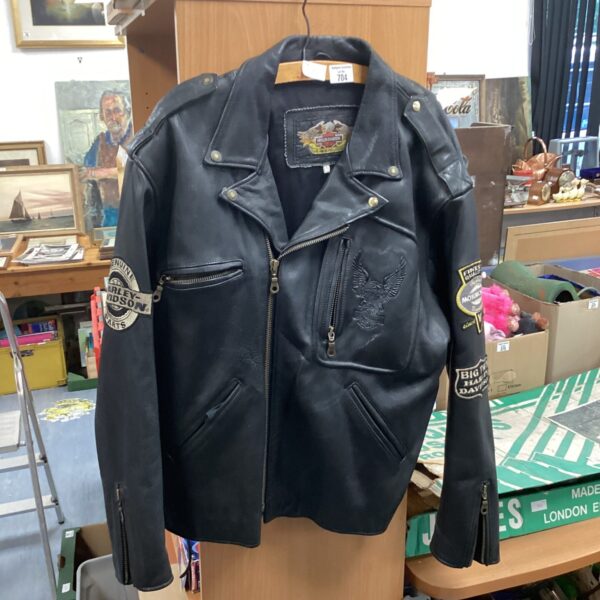 Black Harley Davidson leather jacket with eagle emblem.