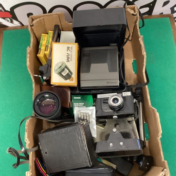 Vintage Polaroid image system camera with accessories in a lot.