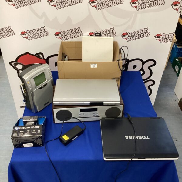 Mixed electrical lot including a Toshiba laptop, HP webcam, and DVD player.