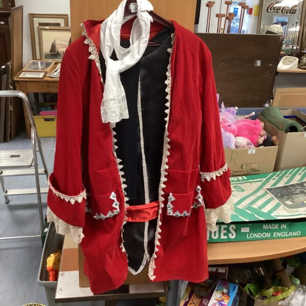 Red pirate costume with coat, trousers, and hat.