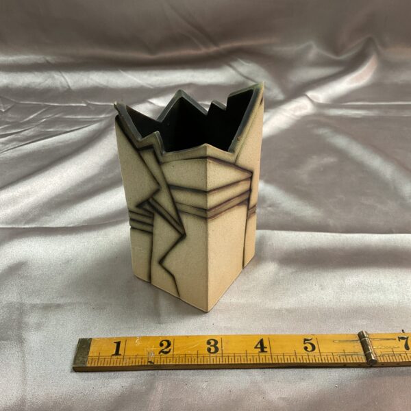 Front view of Carol Daw geometric studio pottery vase.