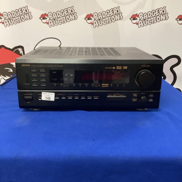 Black Denon AV receiver for vintage home cinema audio.