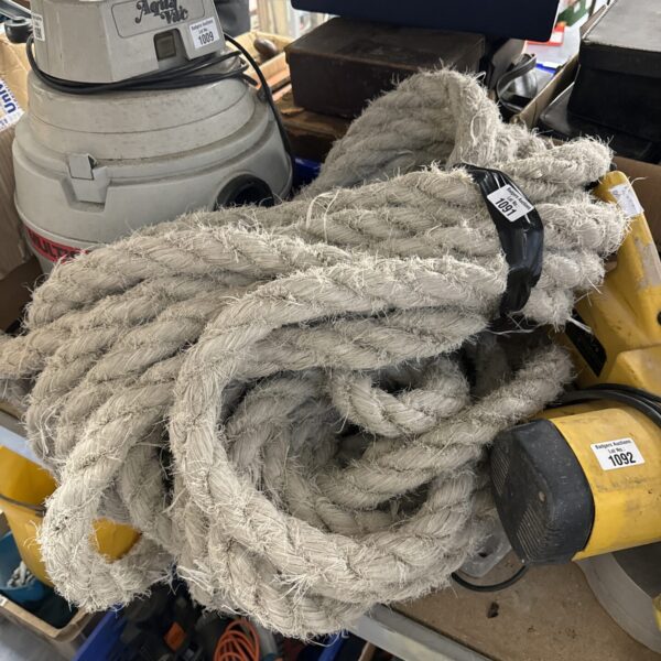 Coiled thick rope for industrial or nautical applications.