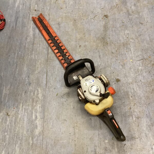 Used Echo HC 1600 petrol hedge trimmer for garden landscaping.