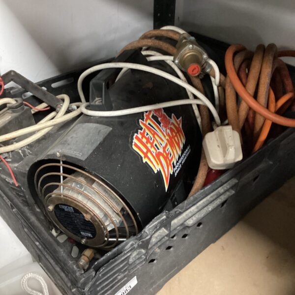 Vintage Heat Demon heater unit with attached hosing.