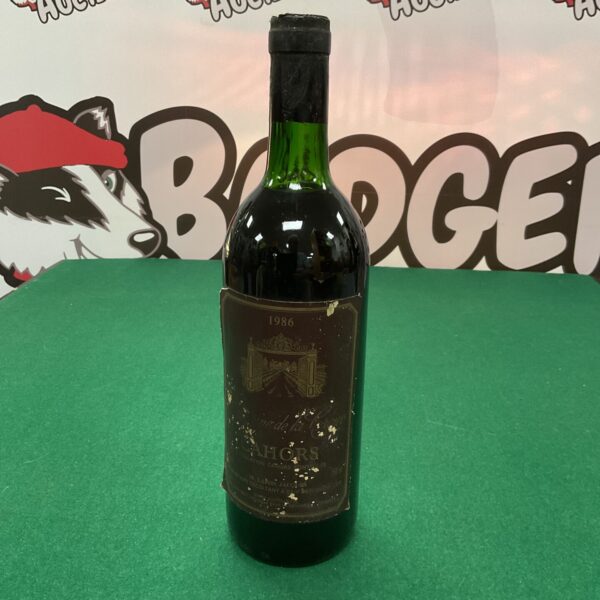 Vintage 1986 Cahors wine bottle, collectible French red wine.