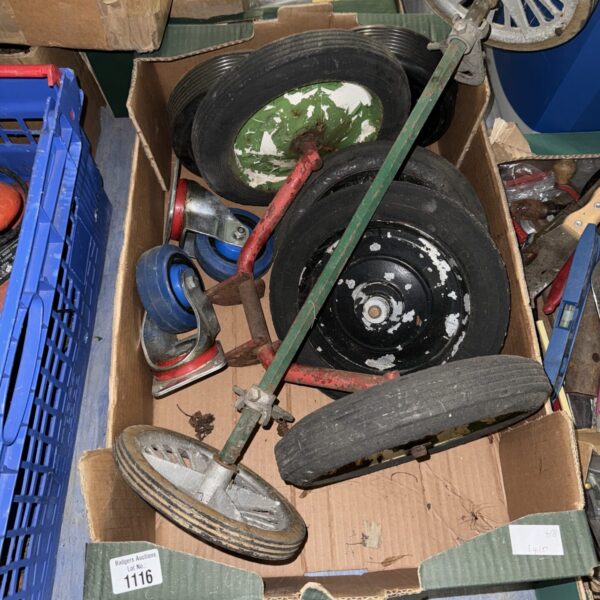 Assorted vintage and industrial wheels in a collection.