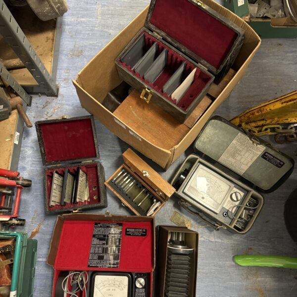 Vintage Eel Lux X10 light meter pair in cases with slides.