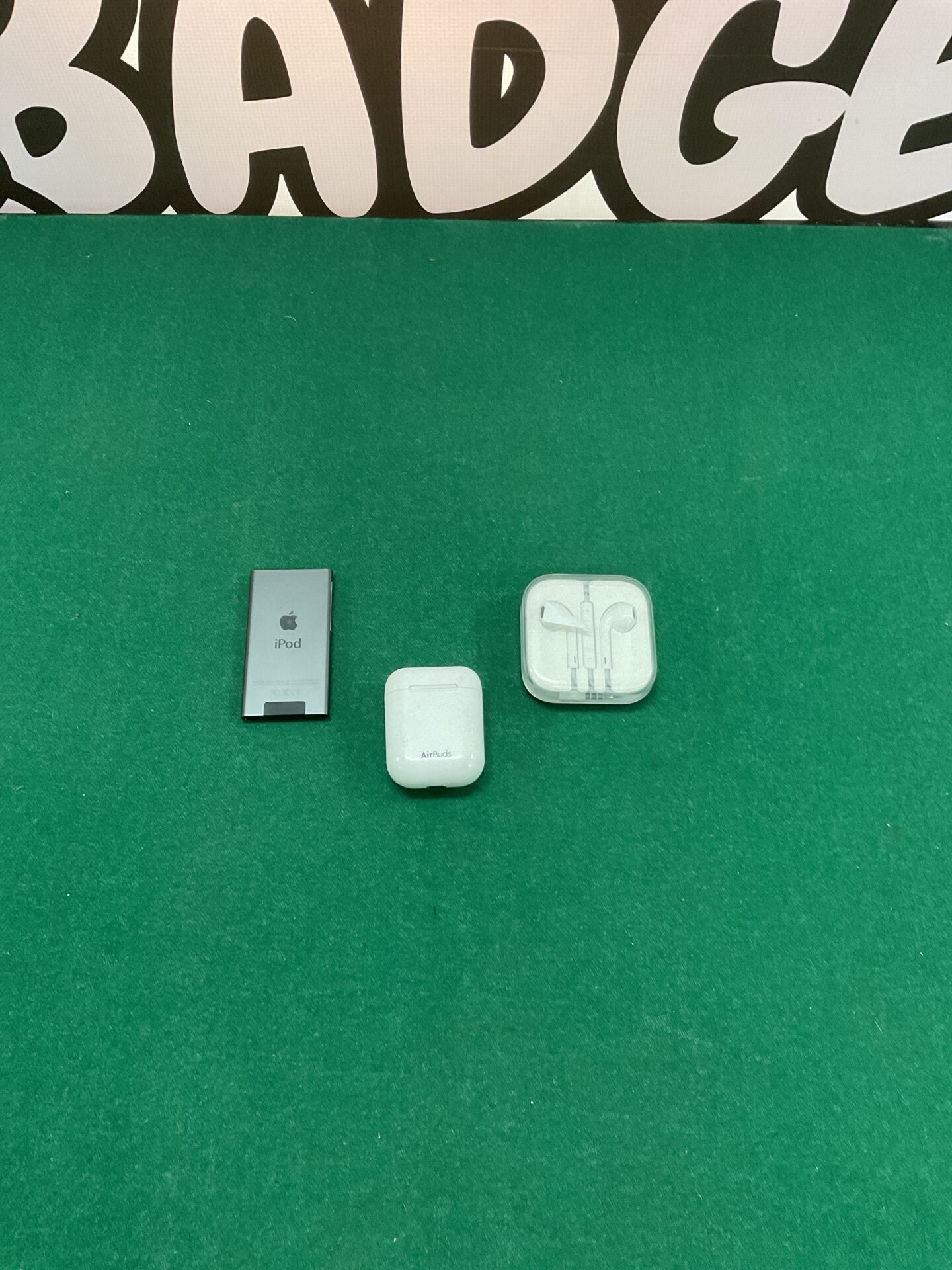 797 Collection of old apple items including iPod, airbuds and wired headphones